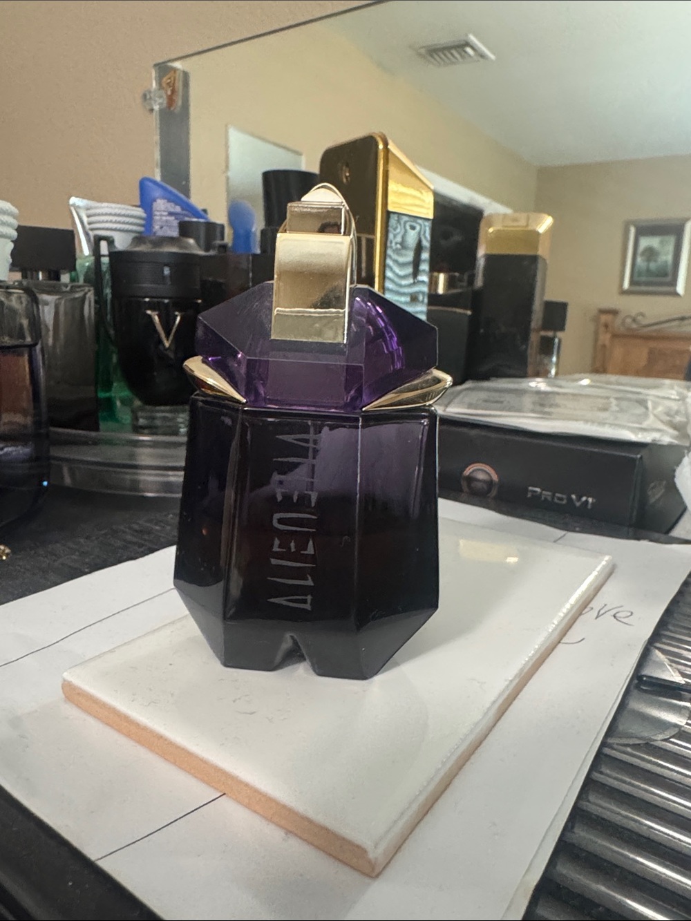 Mugler Alien Deep Purple Bottle with Gold Accents